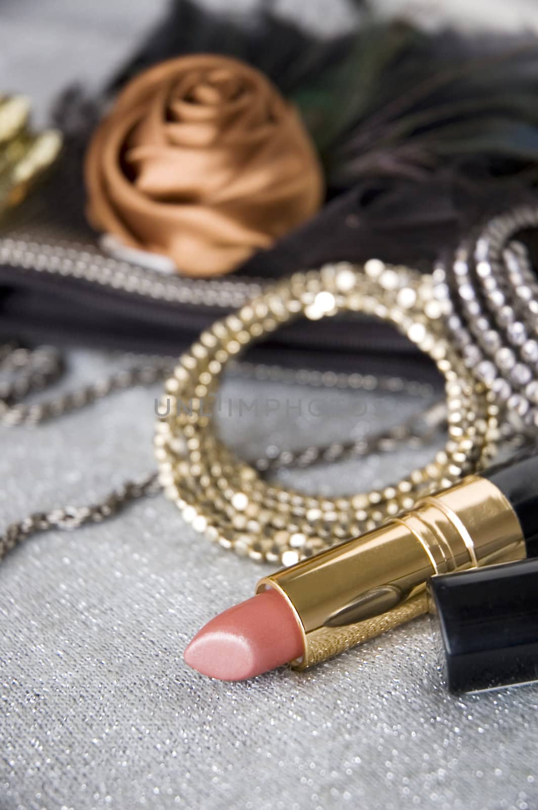pink lipstick and accessories background