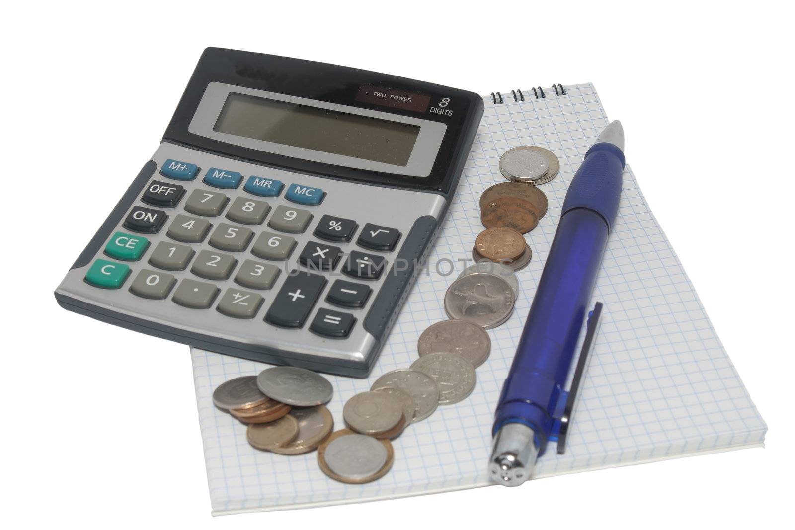 Calculator handle coins and notepad on white background