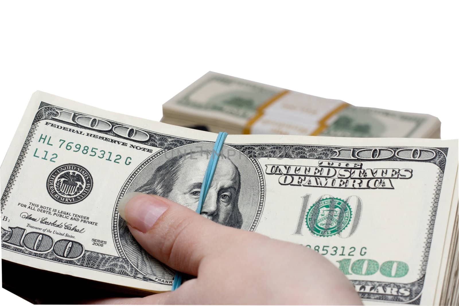 a bundle of money in hand on white background