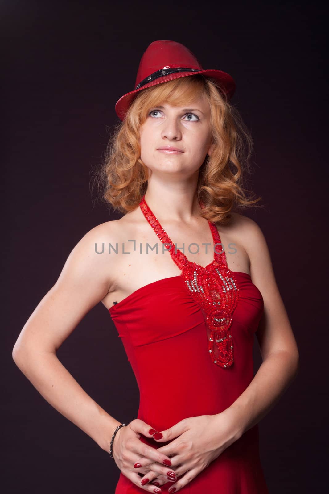 Red-haired girl in a red dress and red hat by victosha