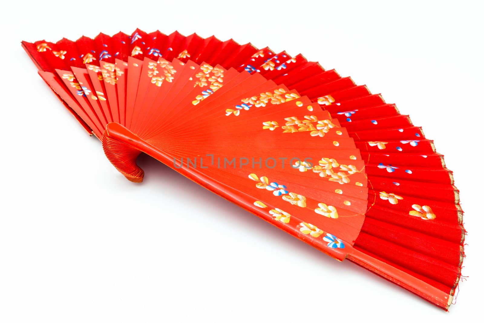 Red spanish fan on a white background