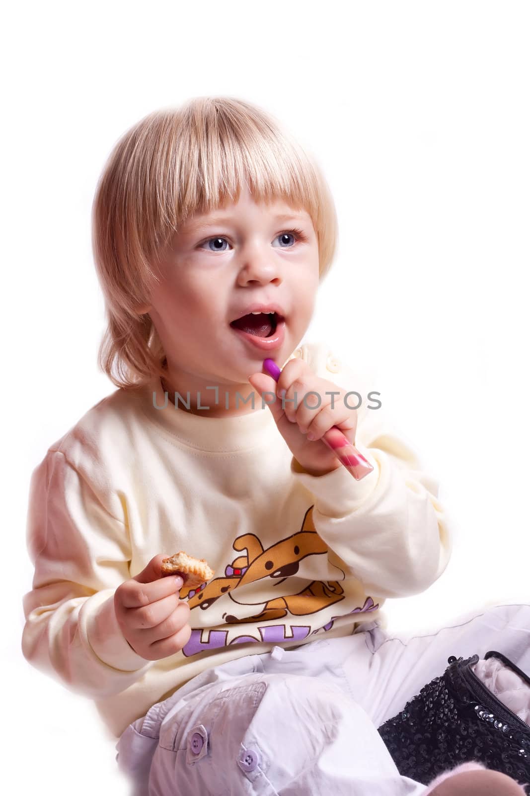 Little girl lipstick on a white background