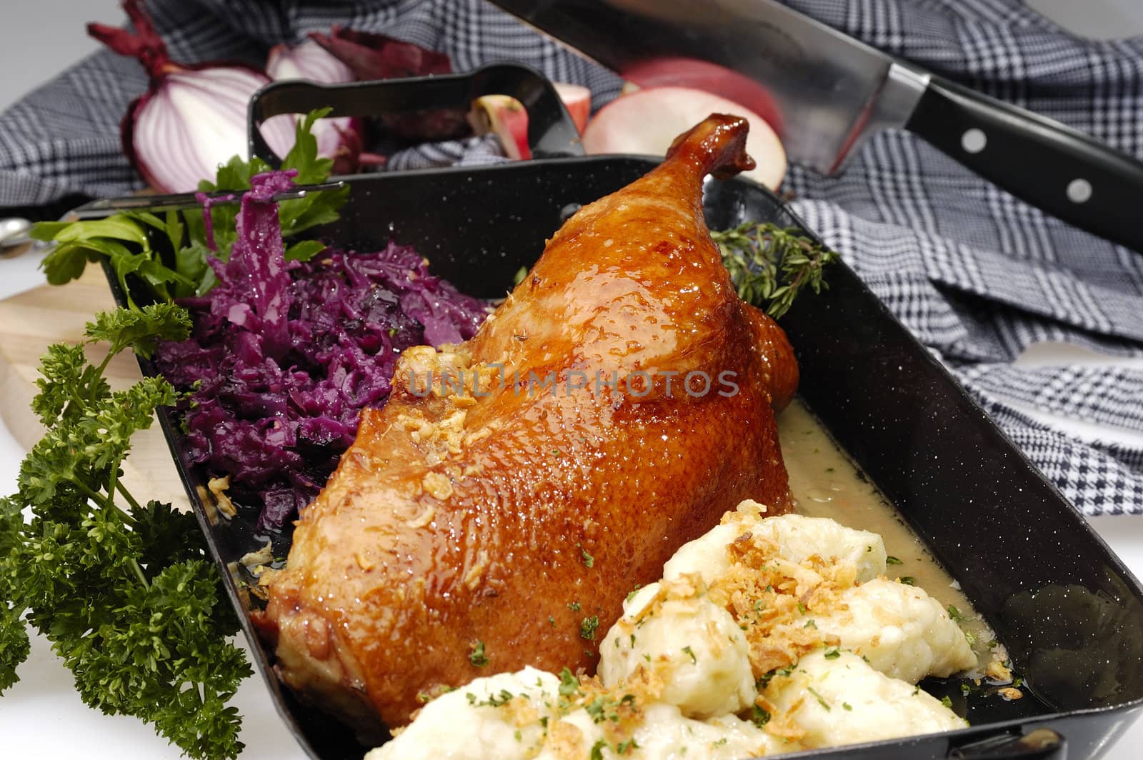 Baked duck with red cabbage and dumplings