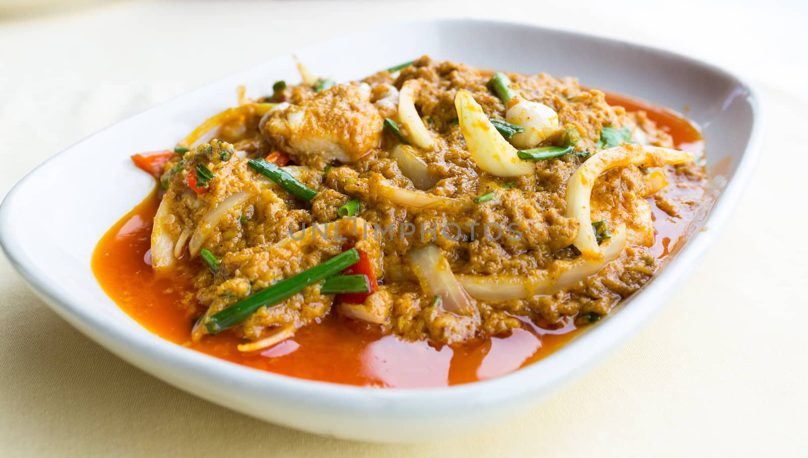Stir-Fried crab with Garlic, Peper, Curry Powder on plate.