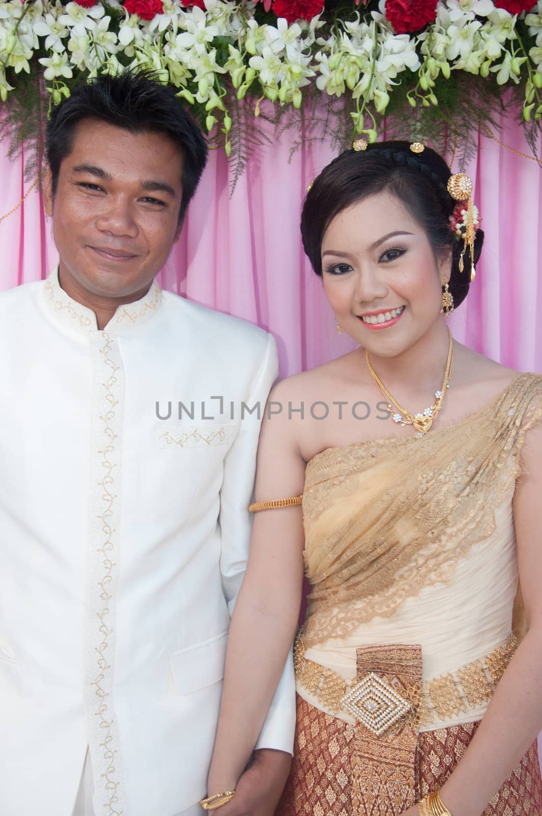 asian thai couple bride and bridegroom in thai wedding suit at w by ngarare