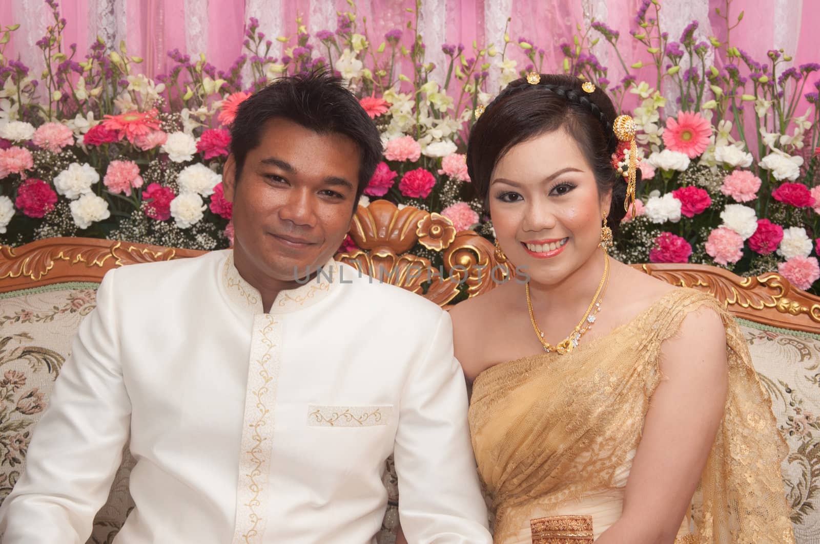 asian thai couple bride and bridegroom in thai wedding suit at wedding ceremony