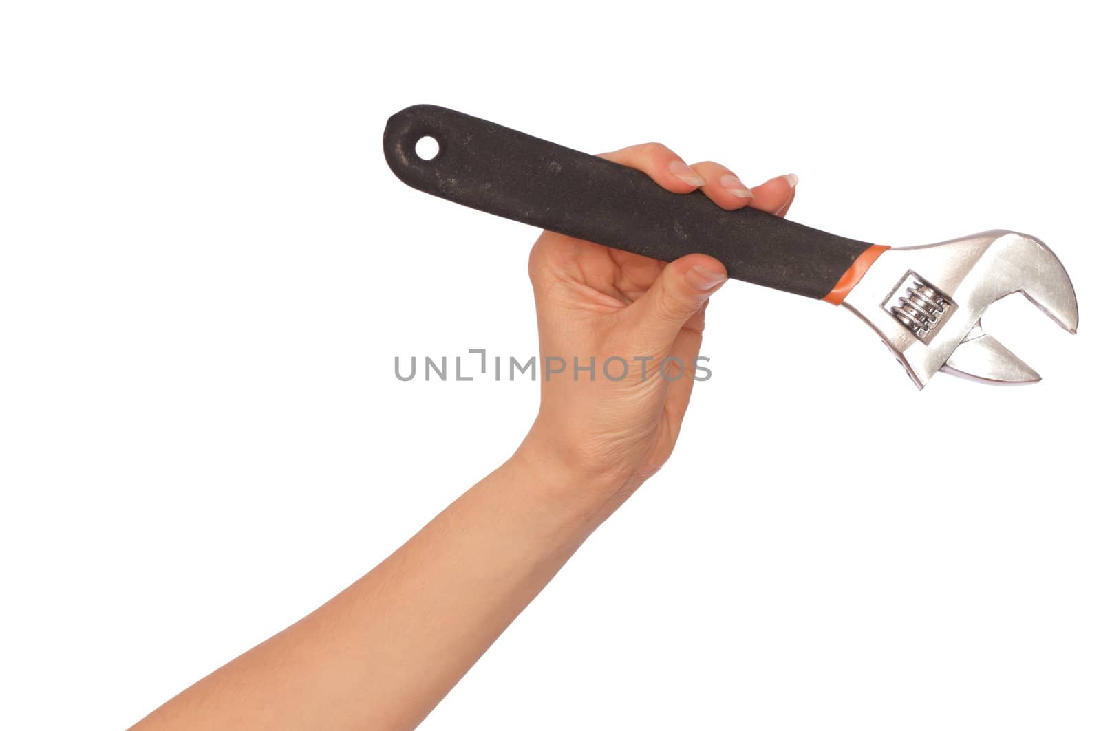 woman holds a big spanner in the hand