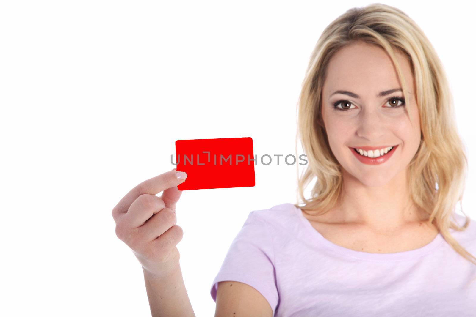 Studio shot of attractive smiling woman with a red card isolated on white Studio shot of attractive smiling woman with a red card isolated on white
