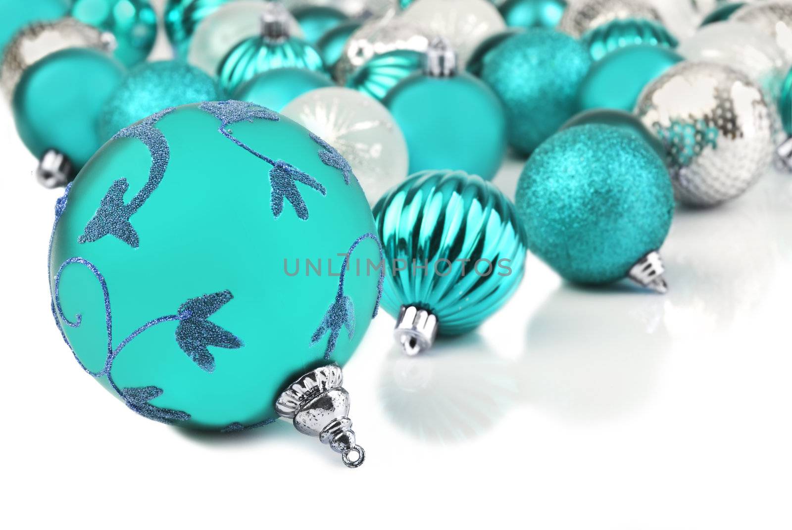 Blue christmas bauble ornaments on white by tish1