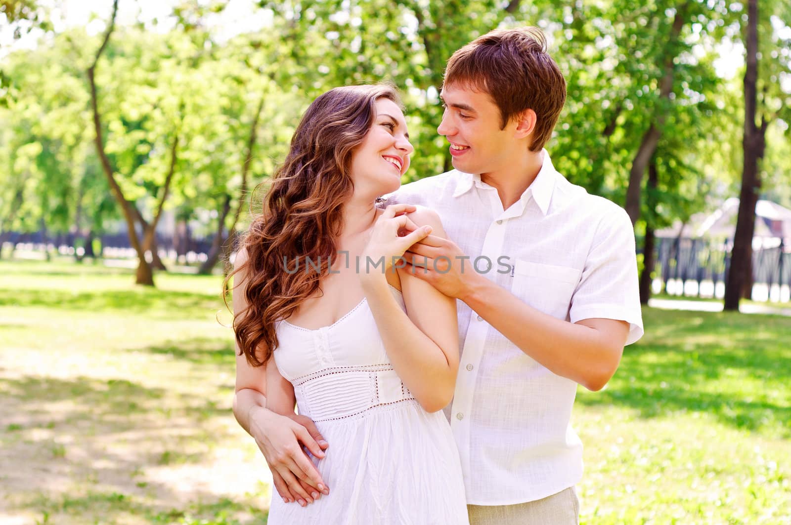 couple hugging in the park, have a good time together