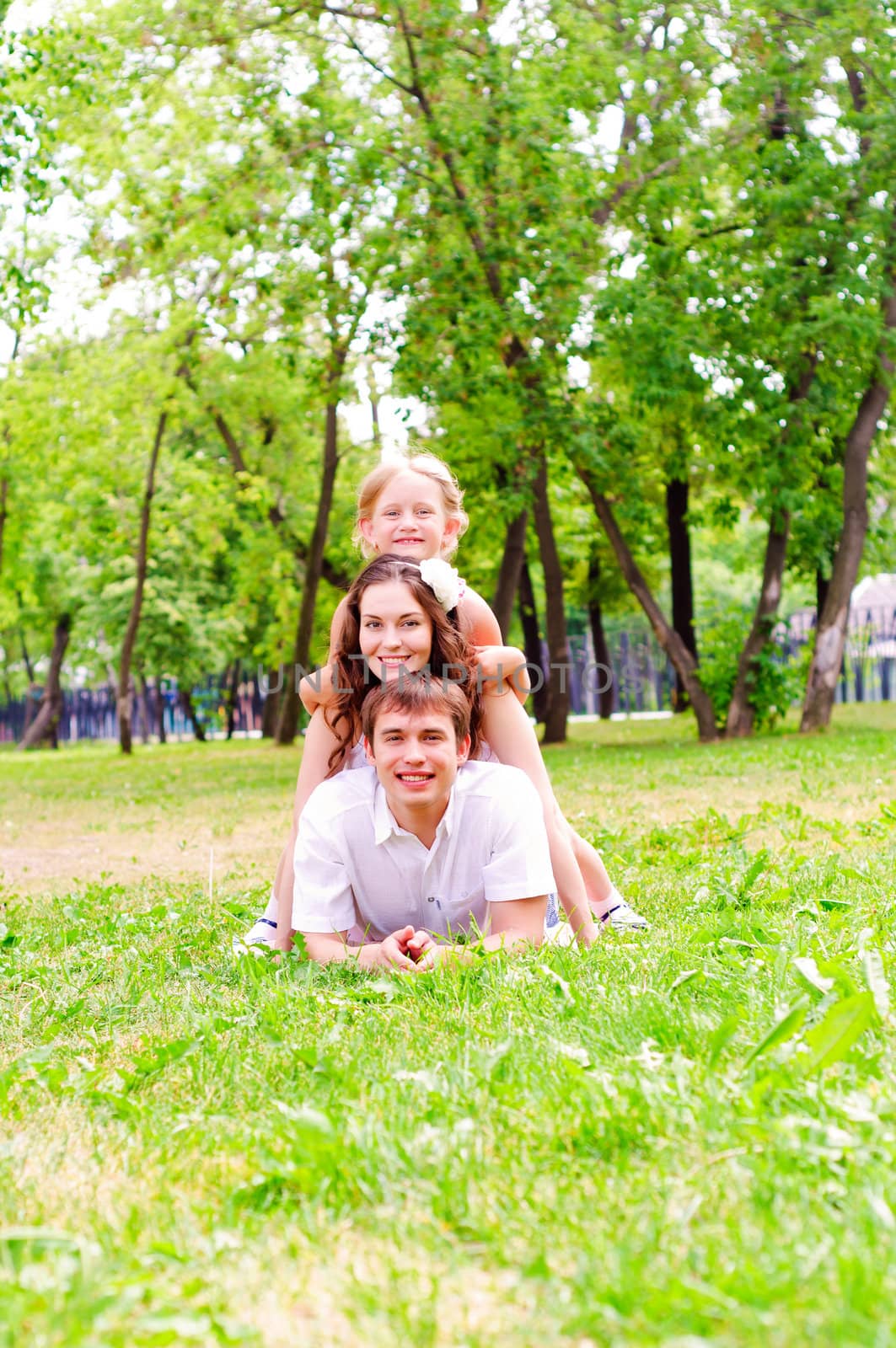Family lying in the park, spend time with family