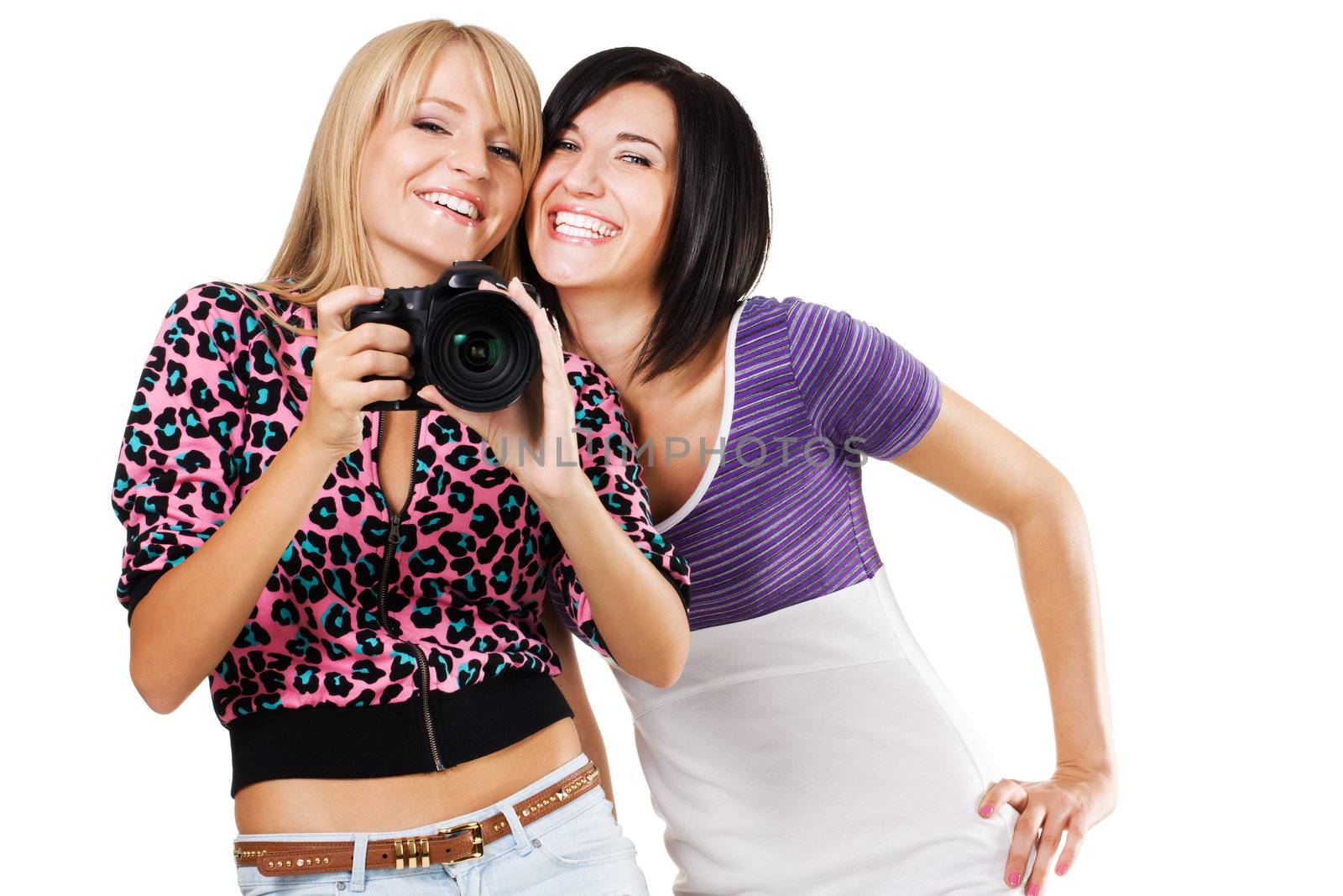 Two lovely friends with a camera, white background