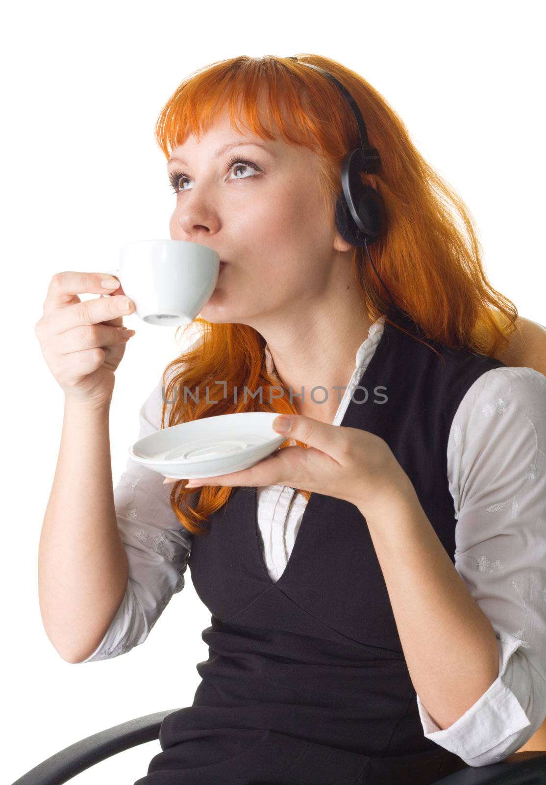 Attractive businesswoman having a coffee break