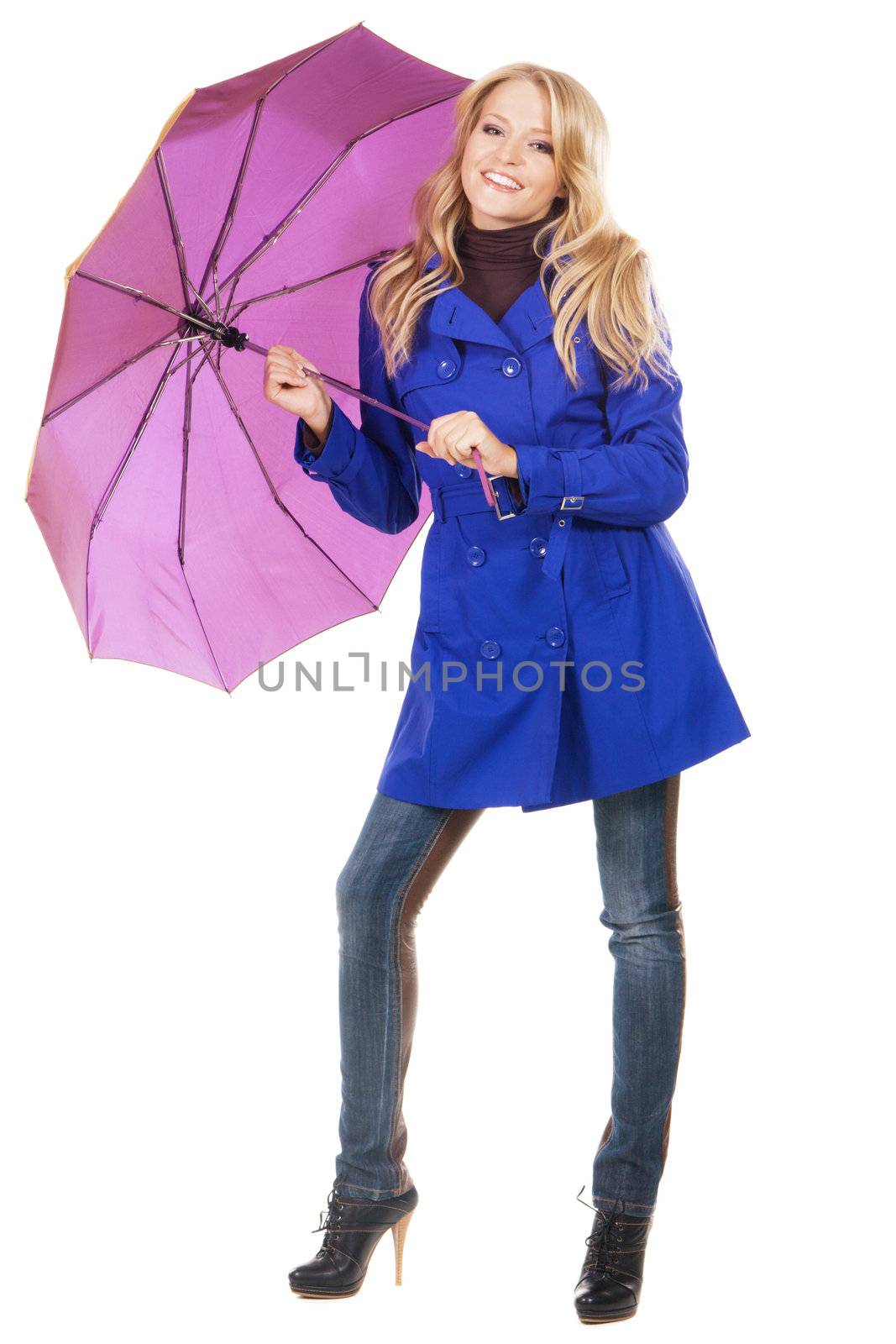 Lovely woman in a blue coat with umbrella against white background