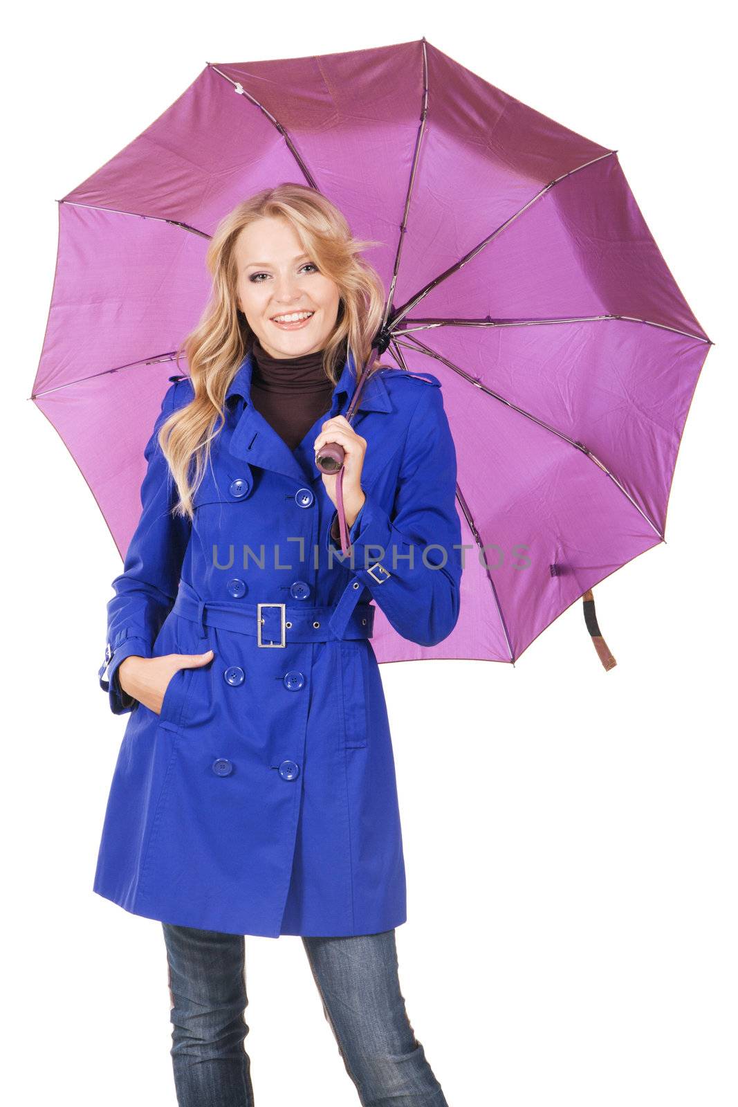 Lovely woman in blue coat with umbrella against white background 