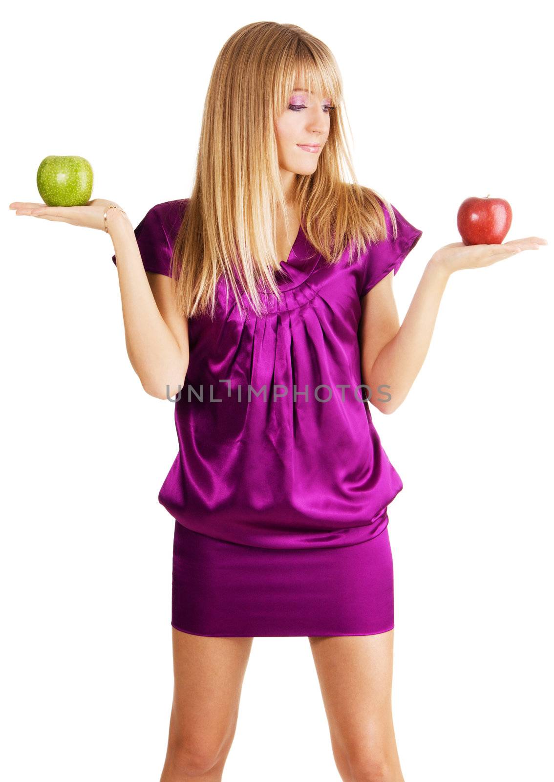 Young beautiful lady weighing two apples, isolated on white background