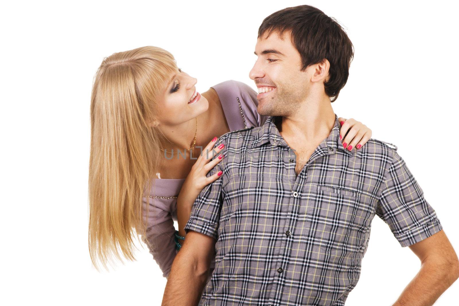 Romantic young couple in casual clothing, white background