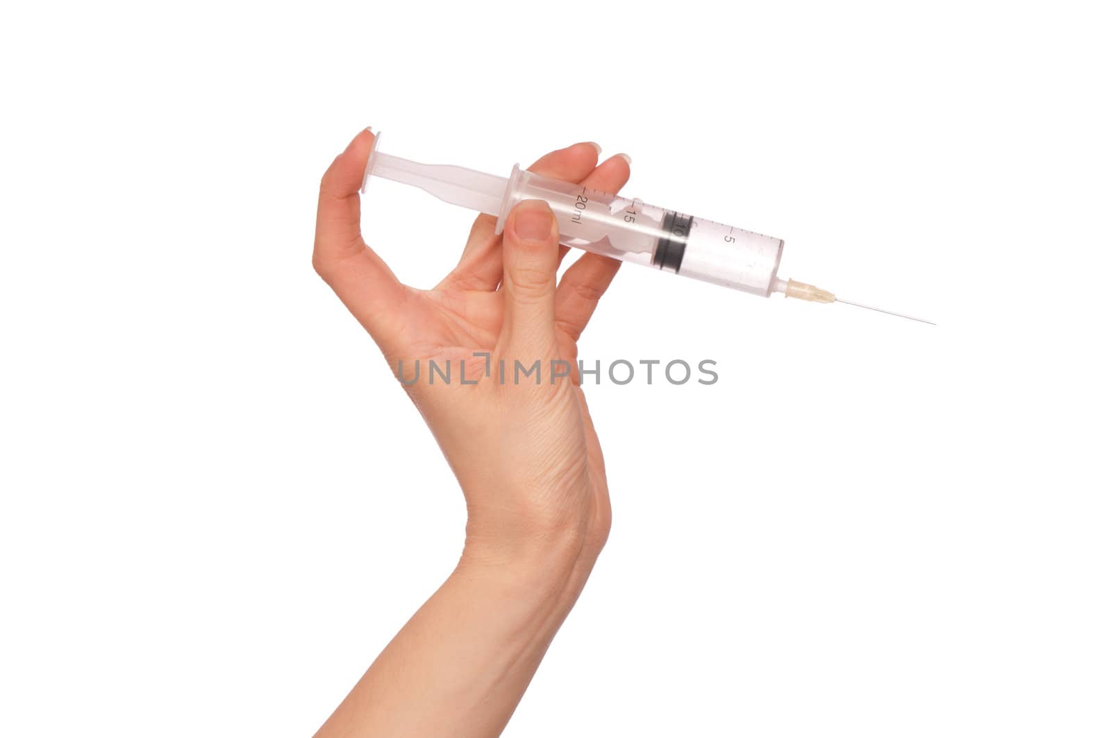 syringe in the woman's hand for making injections