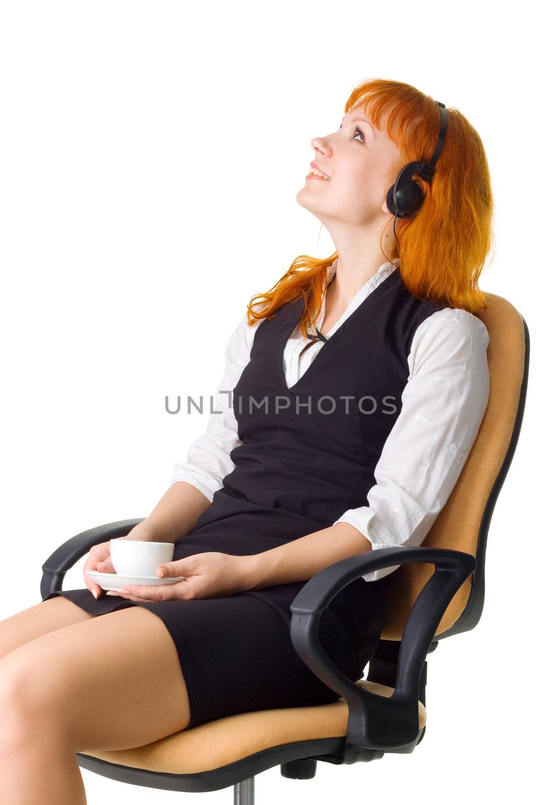 Attractive businesswoman having a coffee break