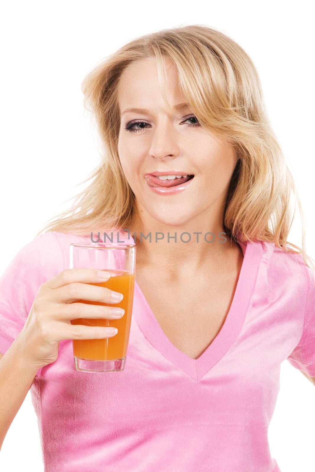 Portrait of a lovely girl with a glass of fresh juice against white background