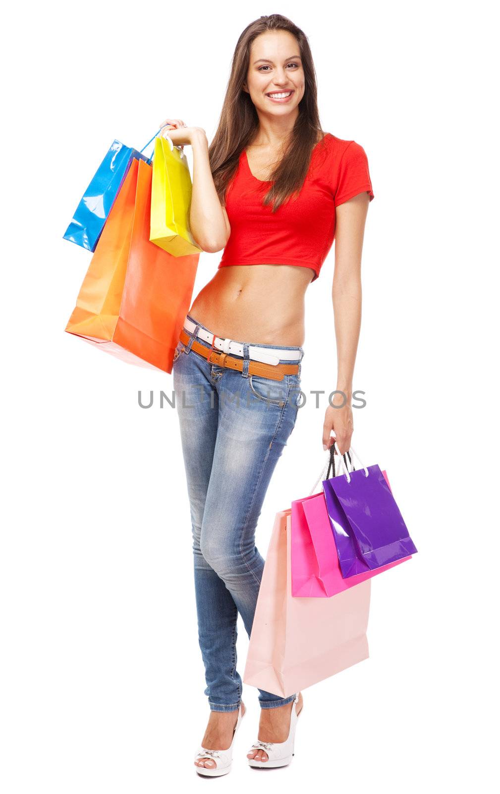 Beautiful lady with shopping bags, isolated on white background