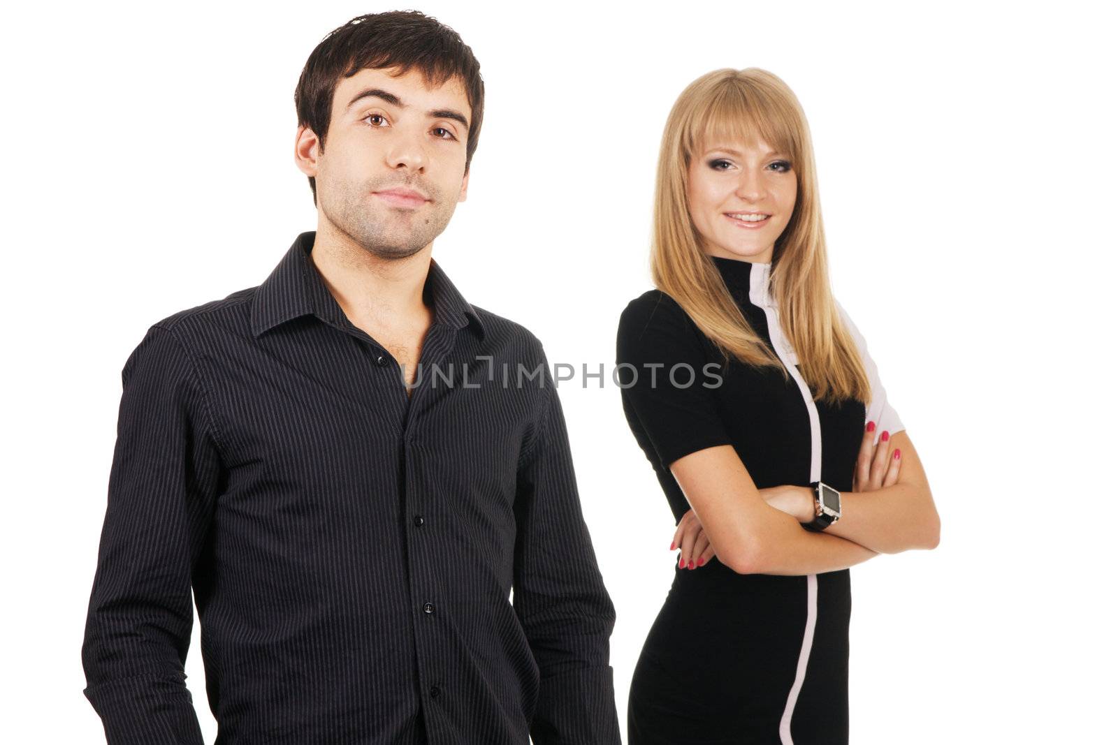 Beautiful young couple in casual clothing, white background