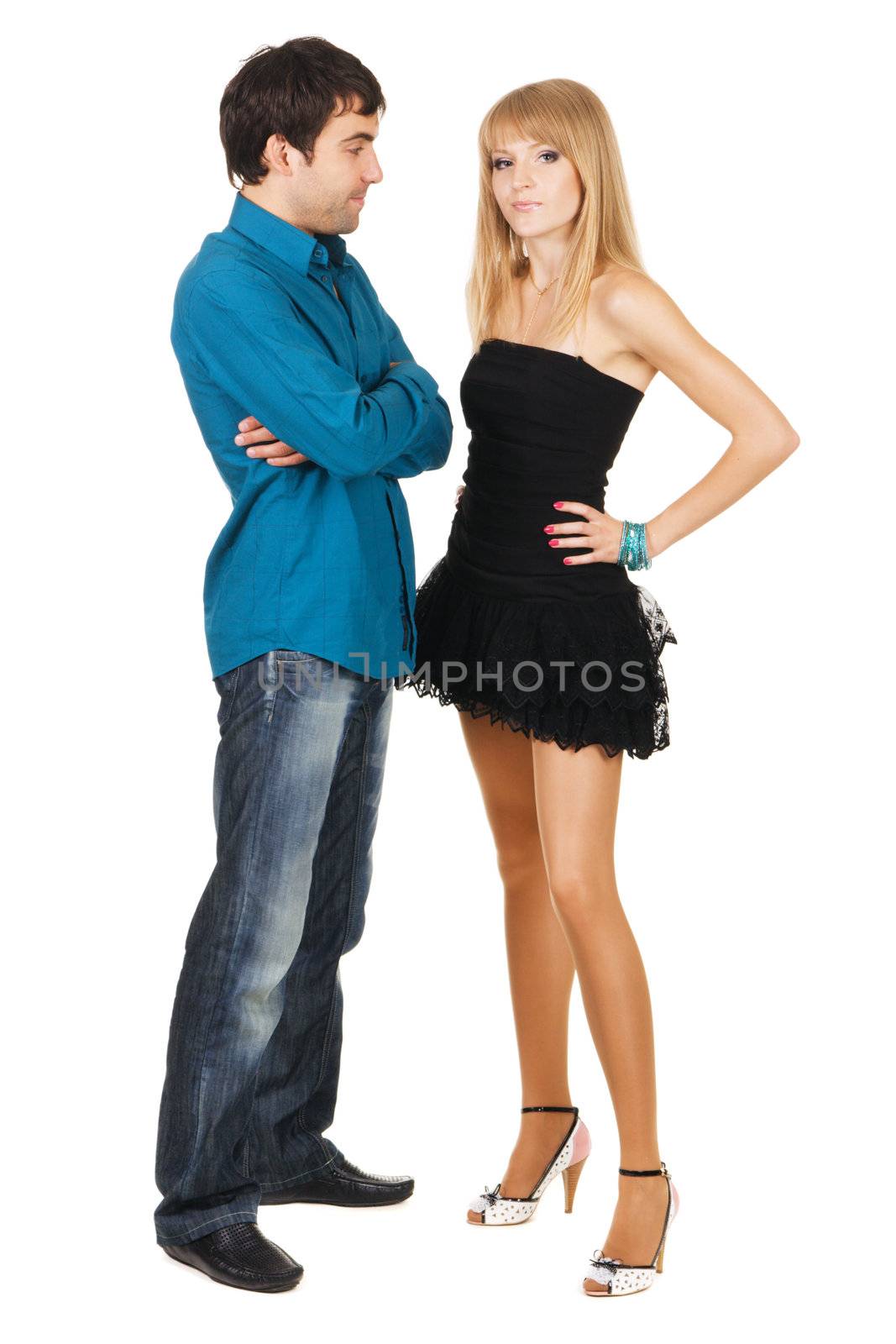 Beautiful young couple in casual clothing, white background