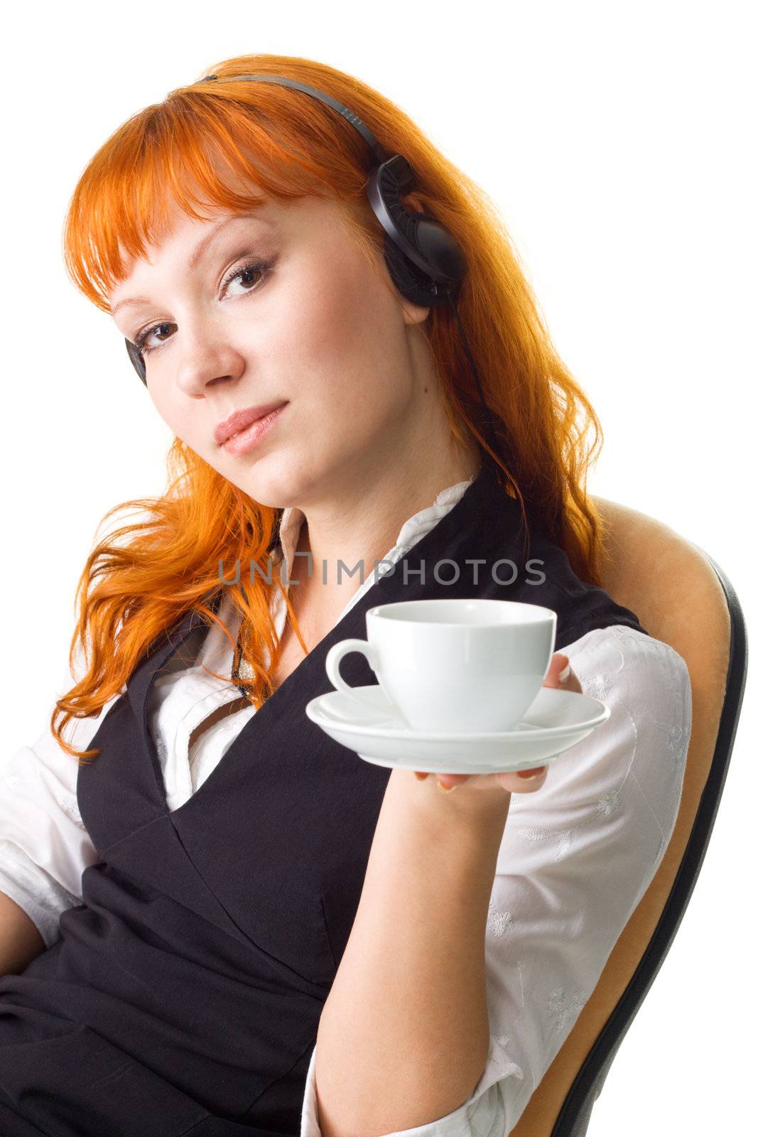 Attractive businesswoman having a coffee break