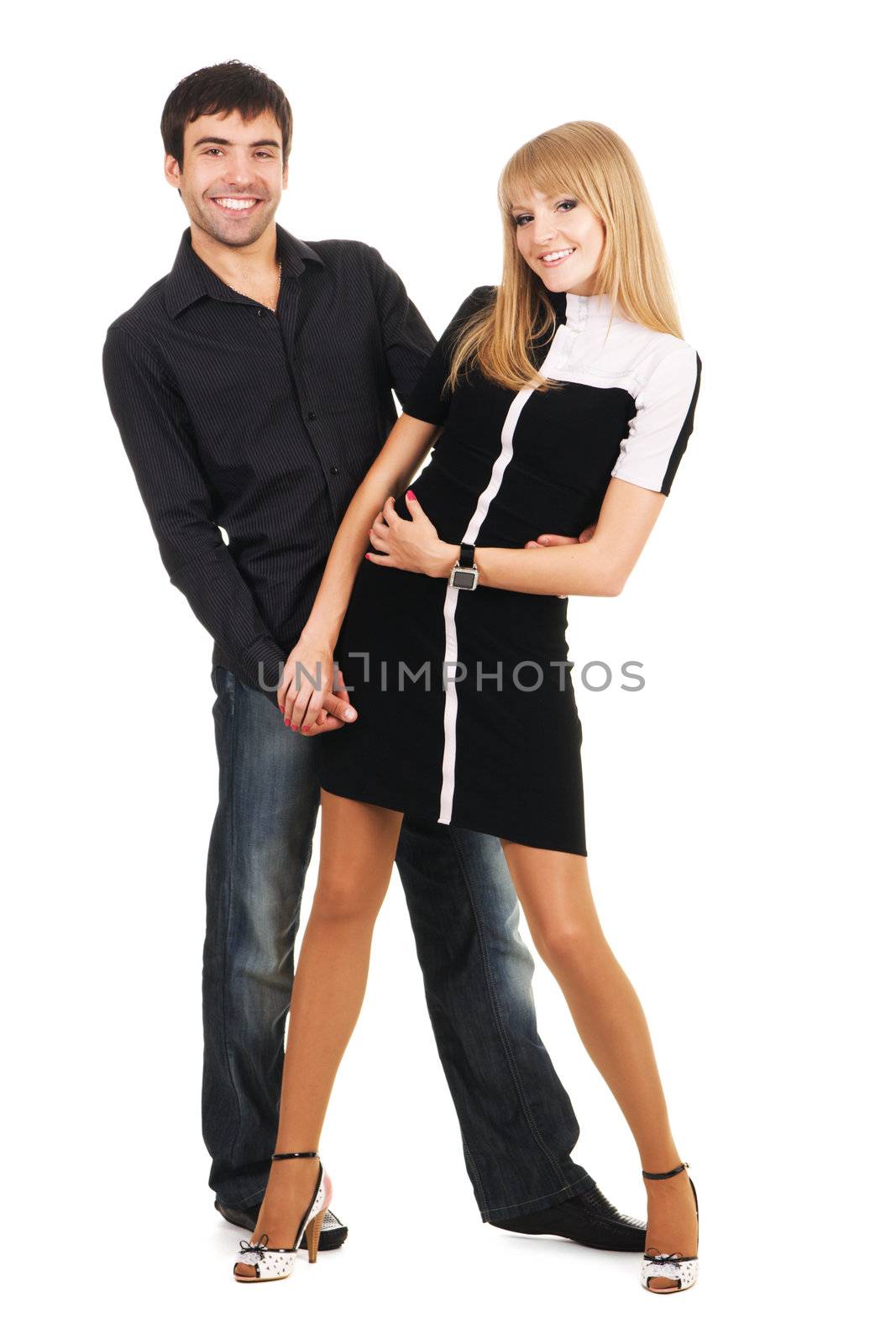 Beautiful young couple in casual clothing, white background