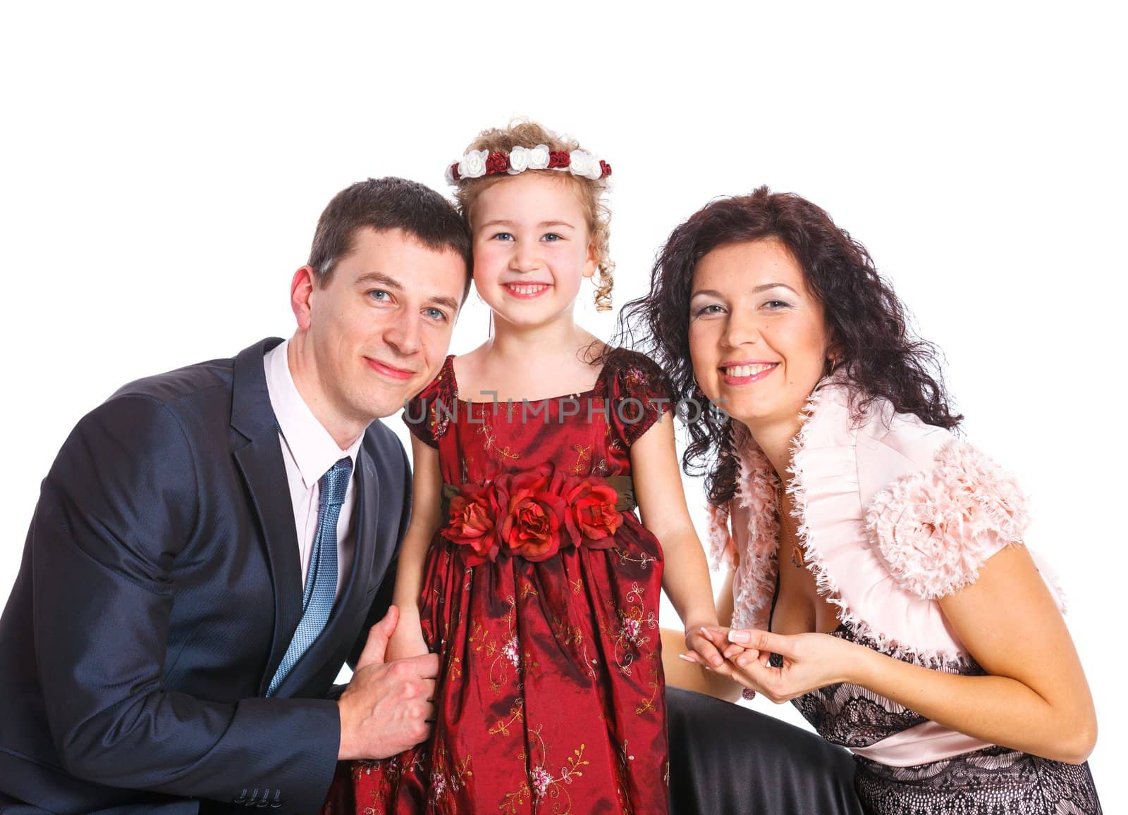 Portrait of happy Caucasian family smiling together on white background