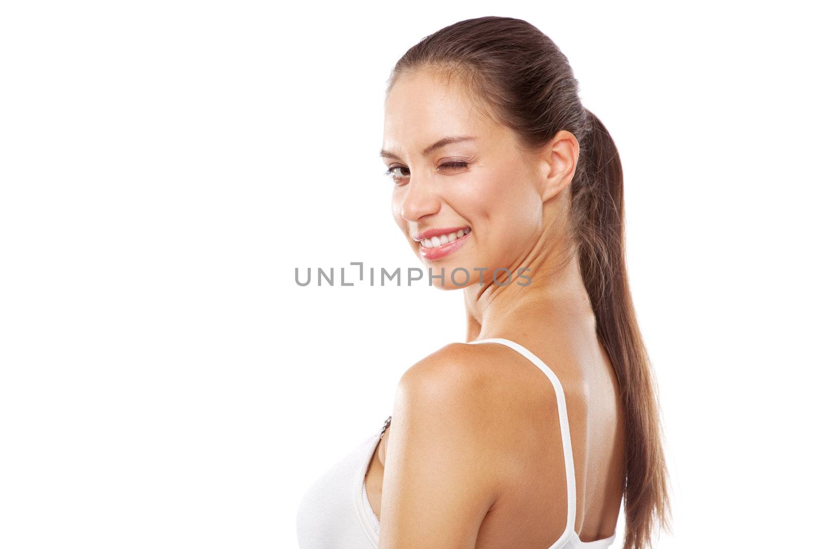 Beautiful young woman in white clothing studio face portrait