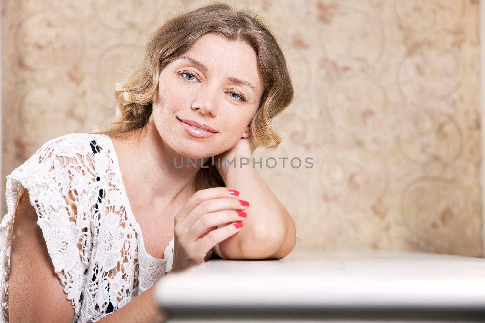 Beautiful lady in a restaurant by Gdolgikh