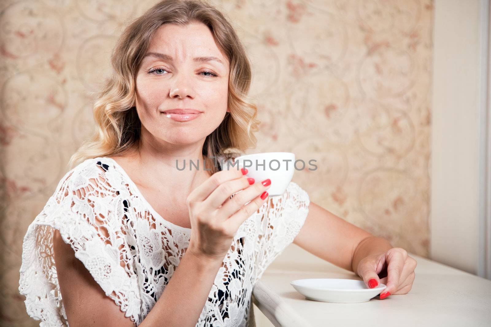 Beautiful lady in a restaurant by Gdolgikh