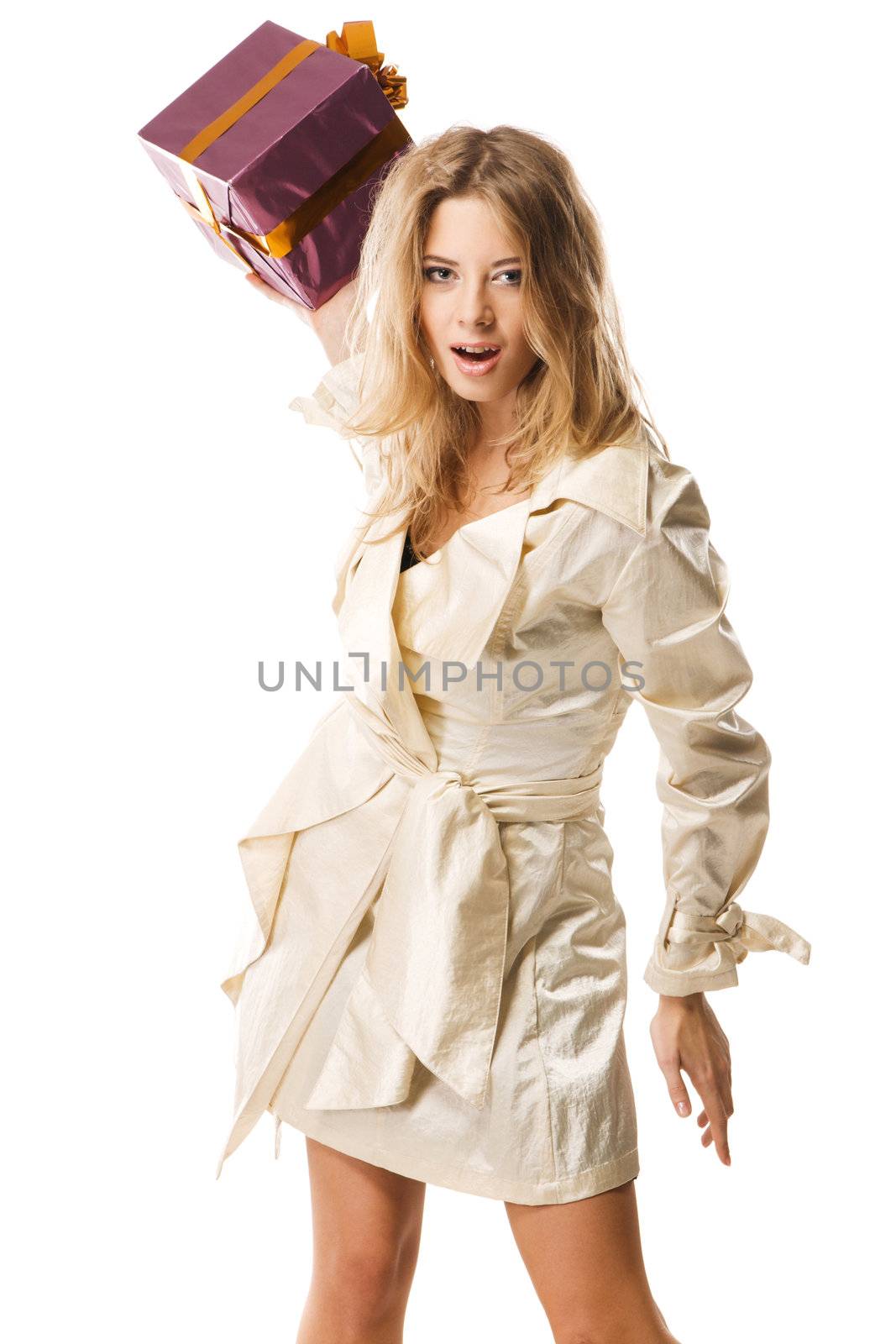 Furious woman throwing a gift box, white background