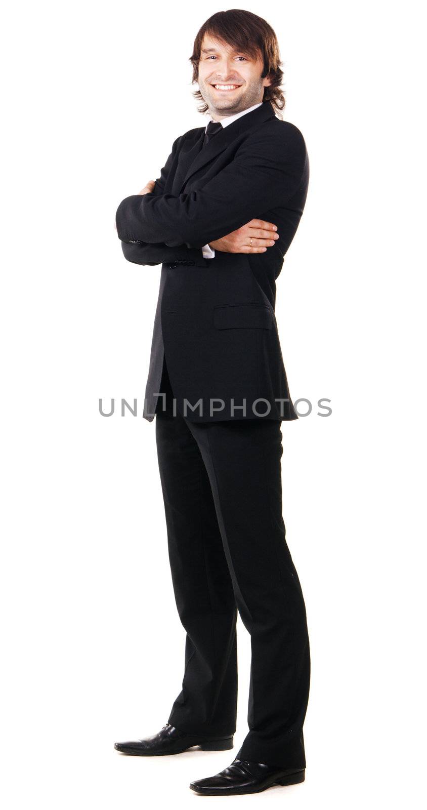 Elegant man in black suit against white background 
