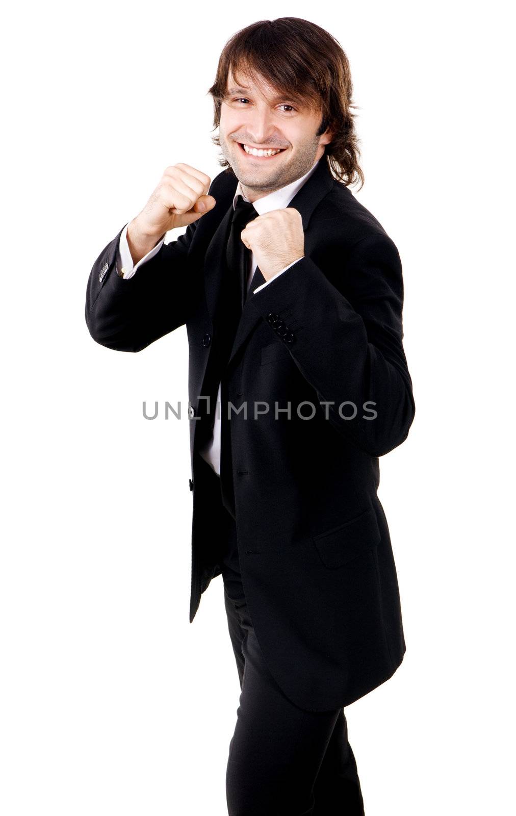Young funny businessman in boxing pose, white background