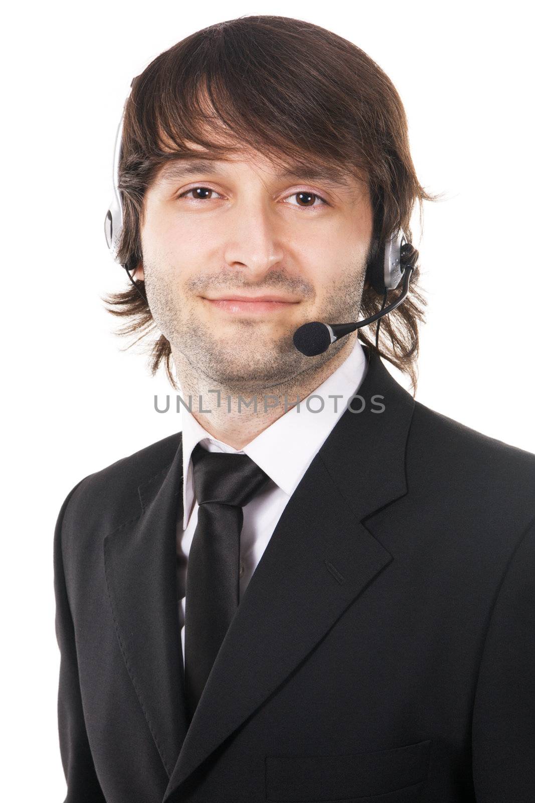 Portrait of a happy young businessman with headset, isolated on white background