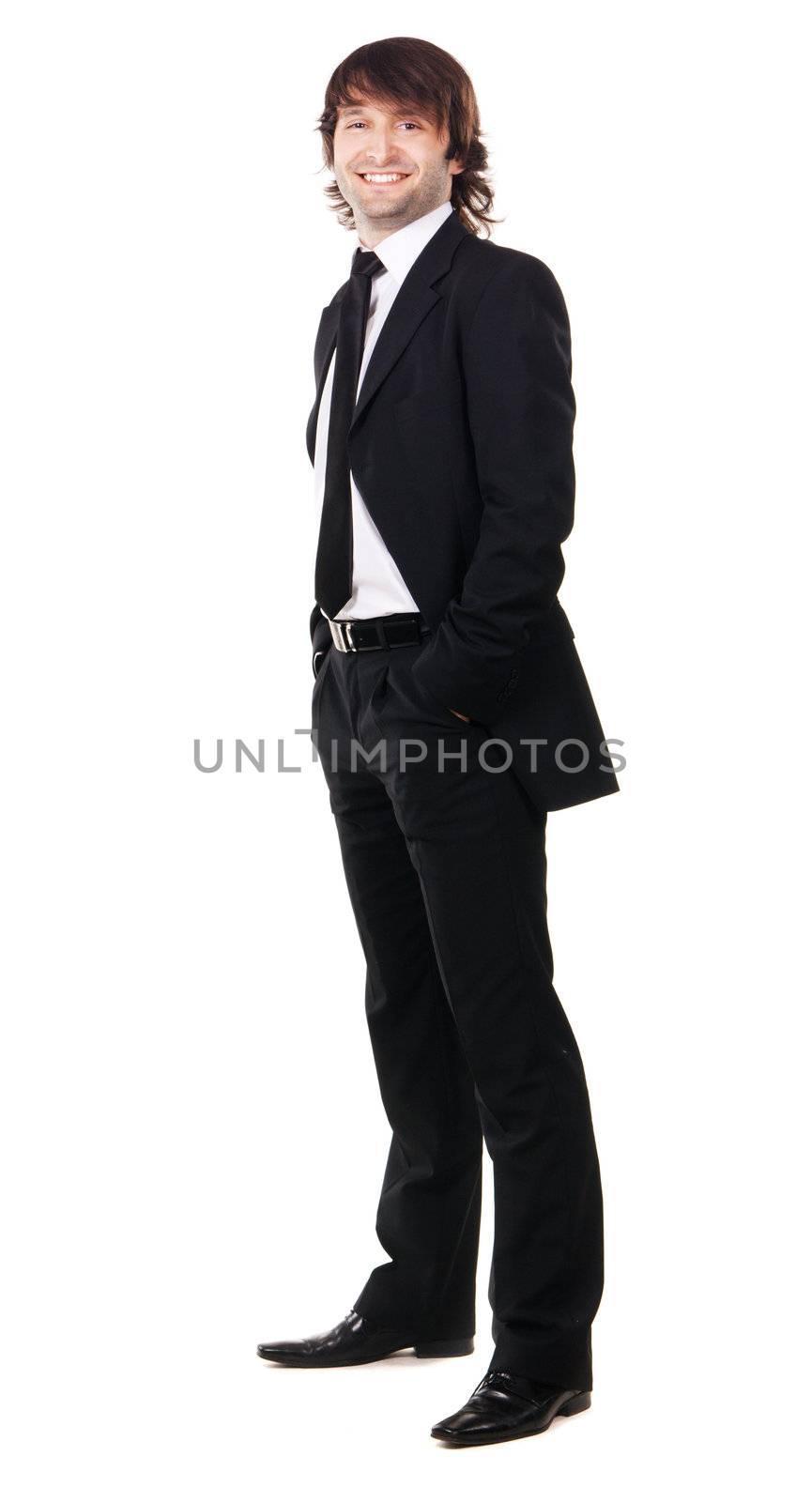 Elegant man in black suit against white background
