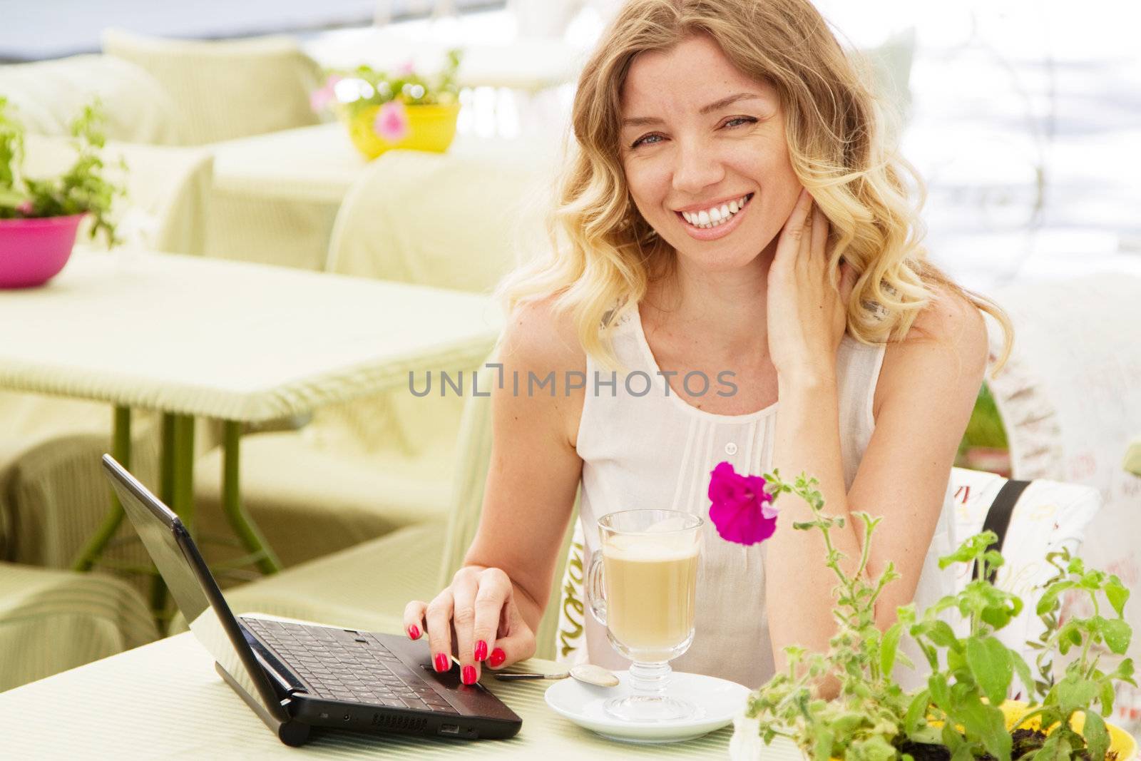 Beautiful lady in a restaurant by Gdolgikh