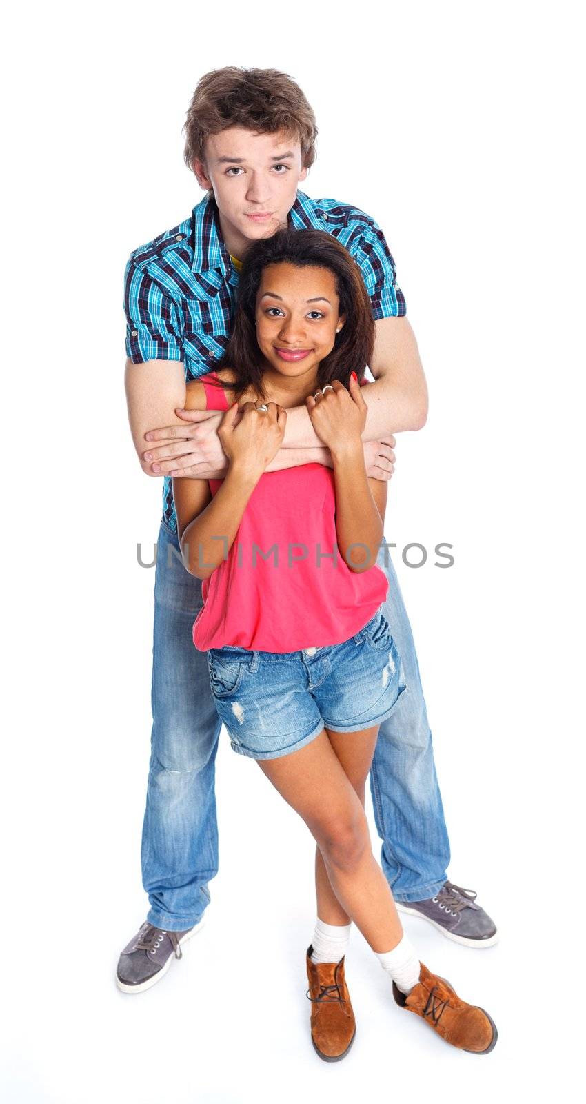 Smiling young man with pretty girlfriend. Isolated on white background.