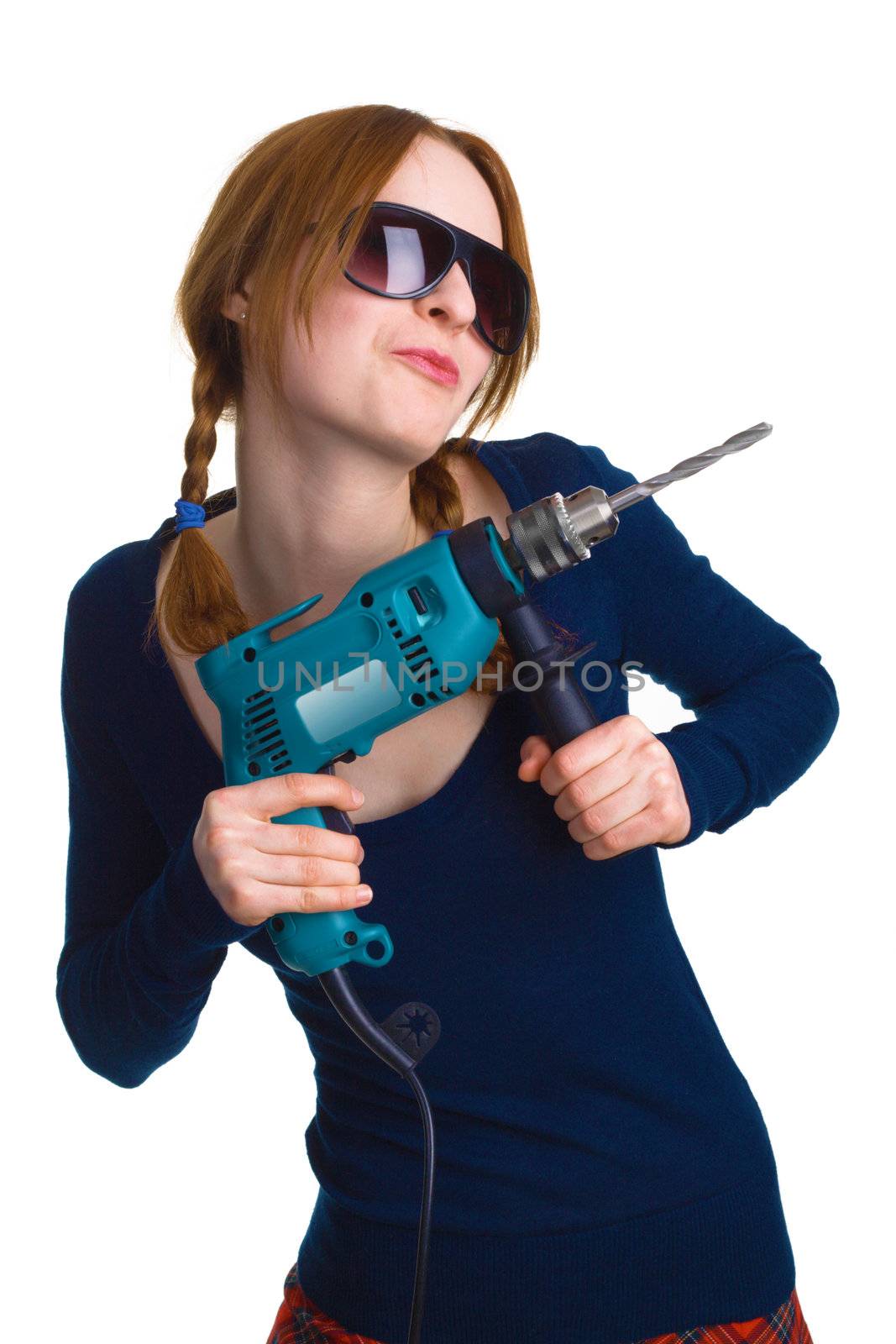 Pretty girl with a drill, isolated on white background