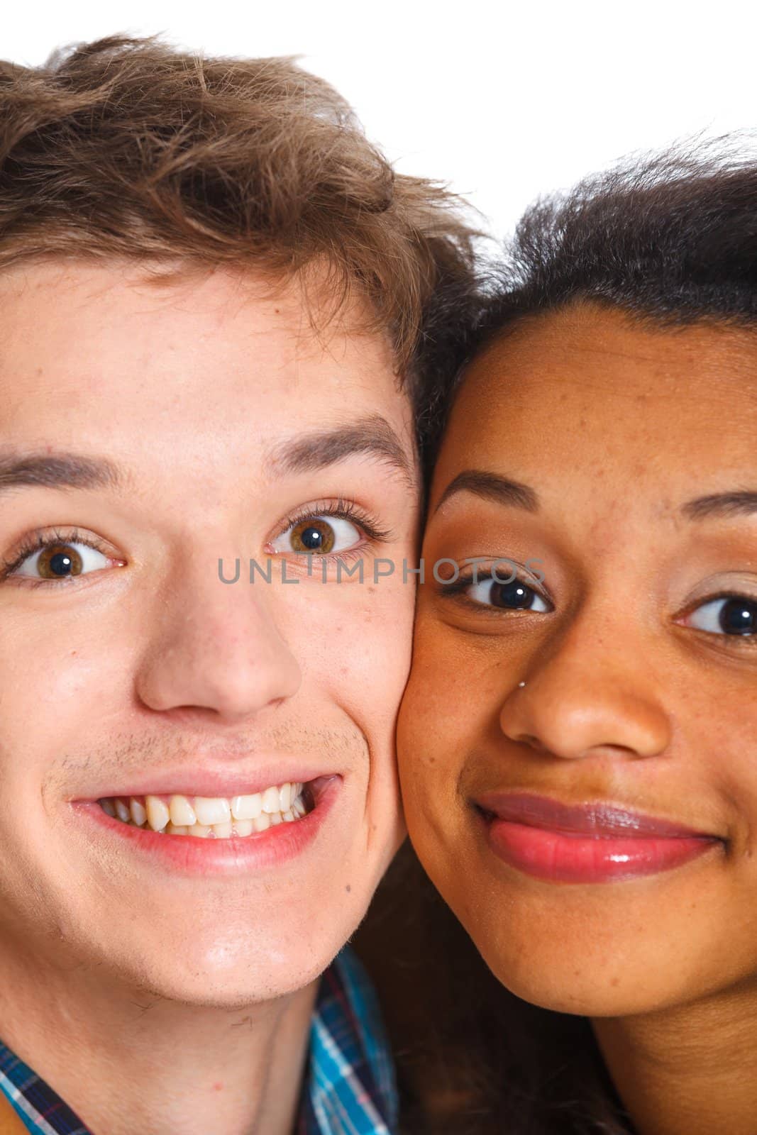 Clouse-up portrait  smiling young man with pretty girlfriend. Isolated on white background.