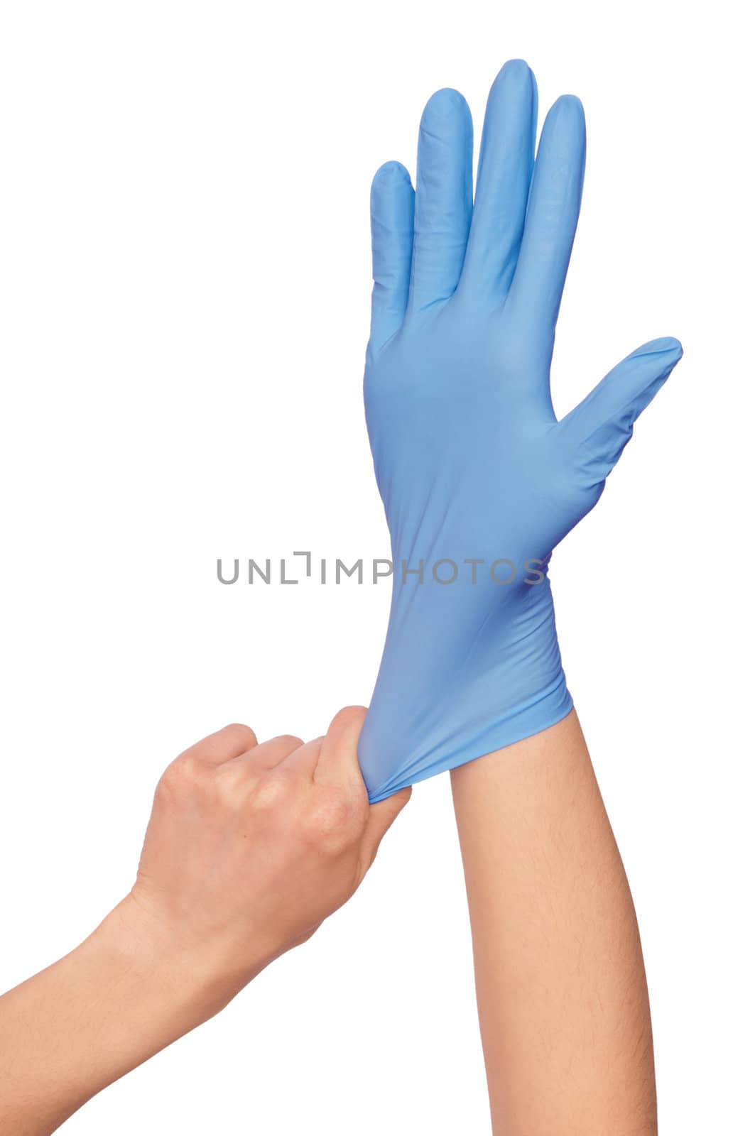 Doctor putting on blue sterilized medical glove for making operation