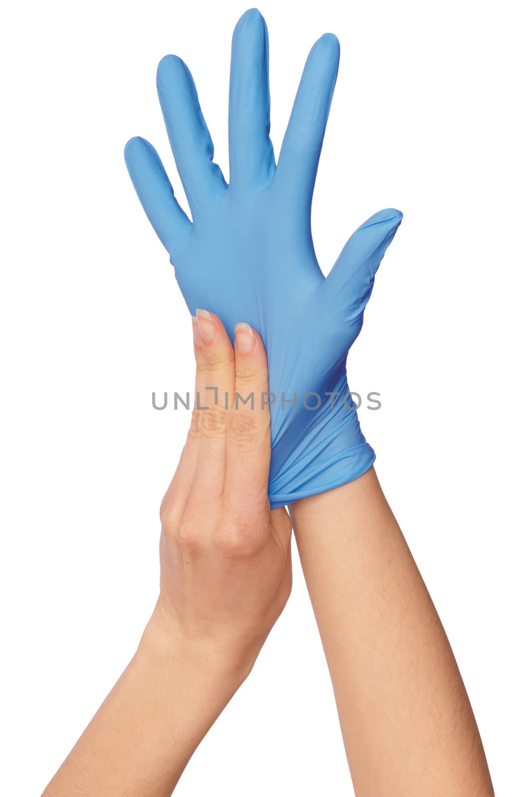 Doctor putting on blue sterilized medical glove for making operation