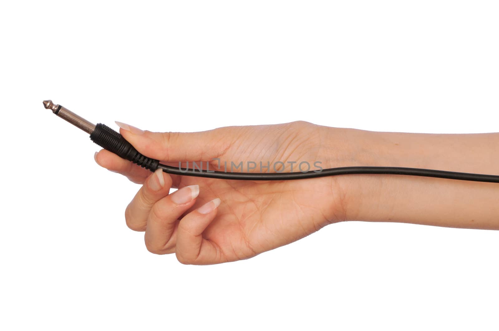 woman holds mono jack for electroguitar in the hand