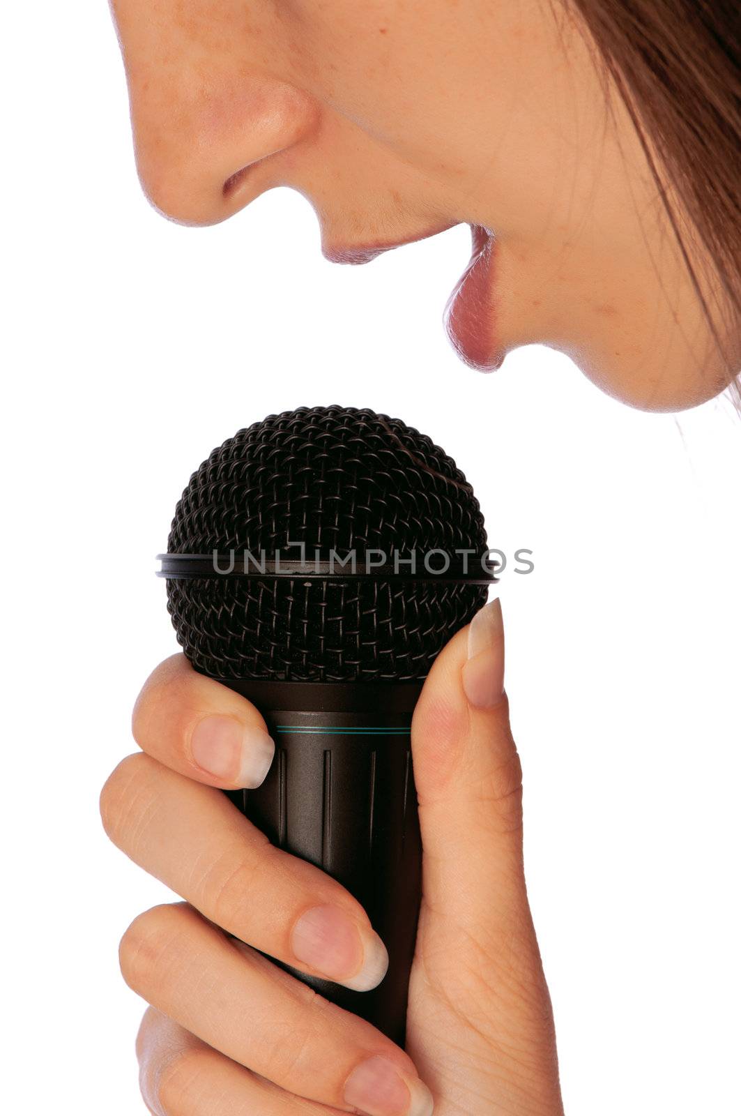 The singer sings a song in a microphone
