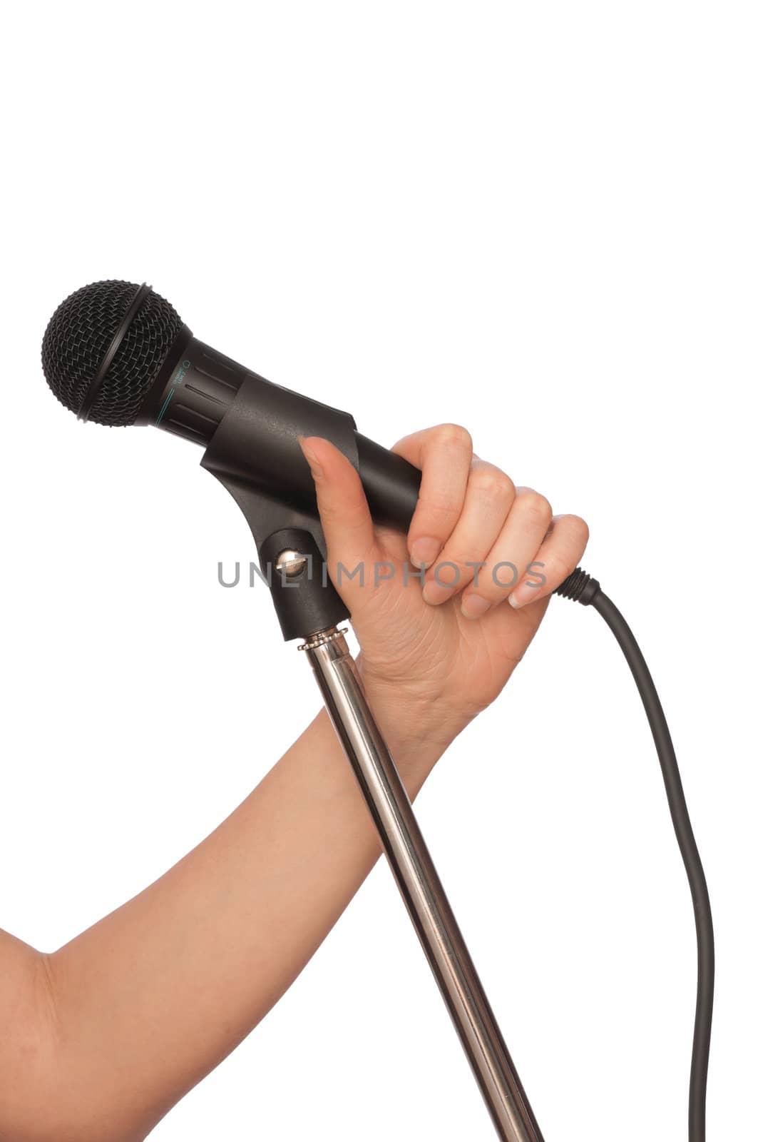 woman holding big black microphone for singing