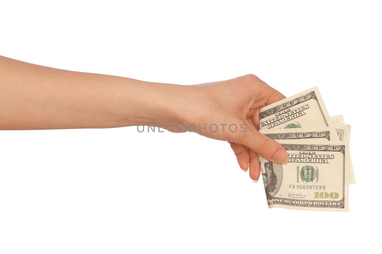 Woman buying goods in the supermarket with dollars