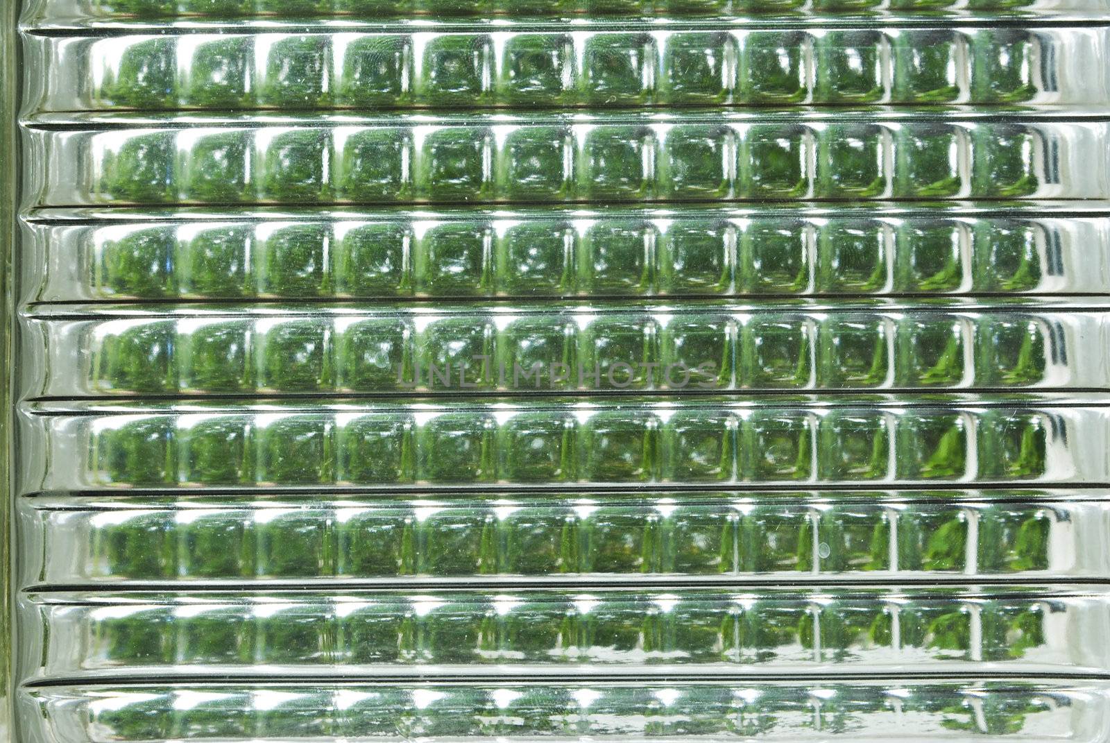 Sunlight through the glass.
