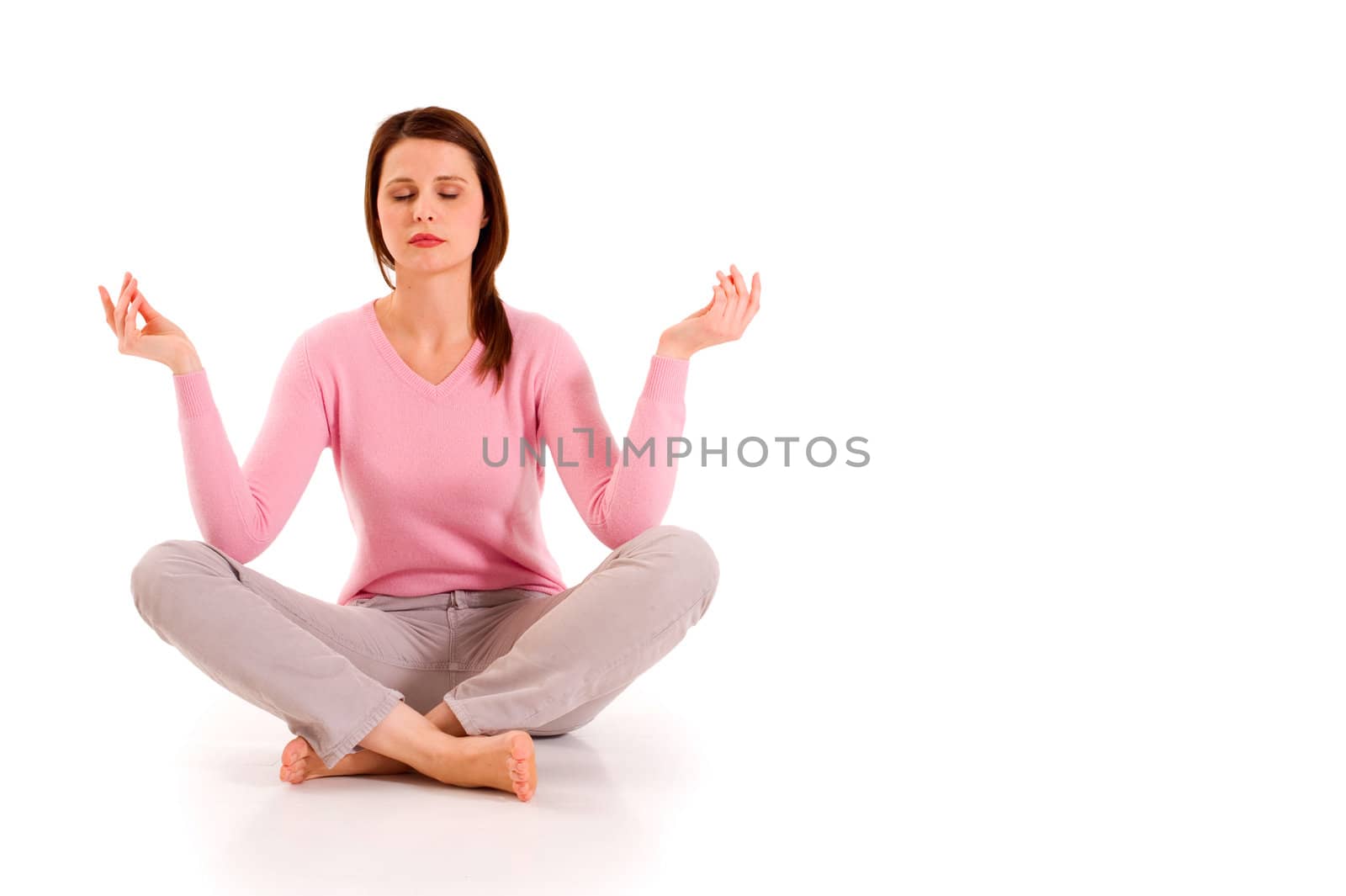 woman practicing yoga by ambro